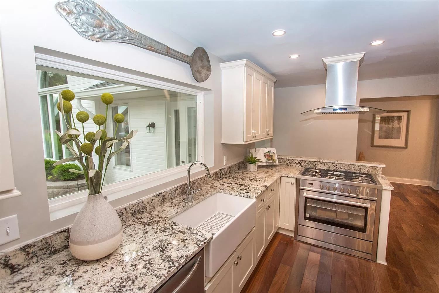 Renovated ranch kitchen with gas range and garden window